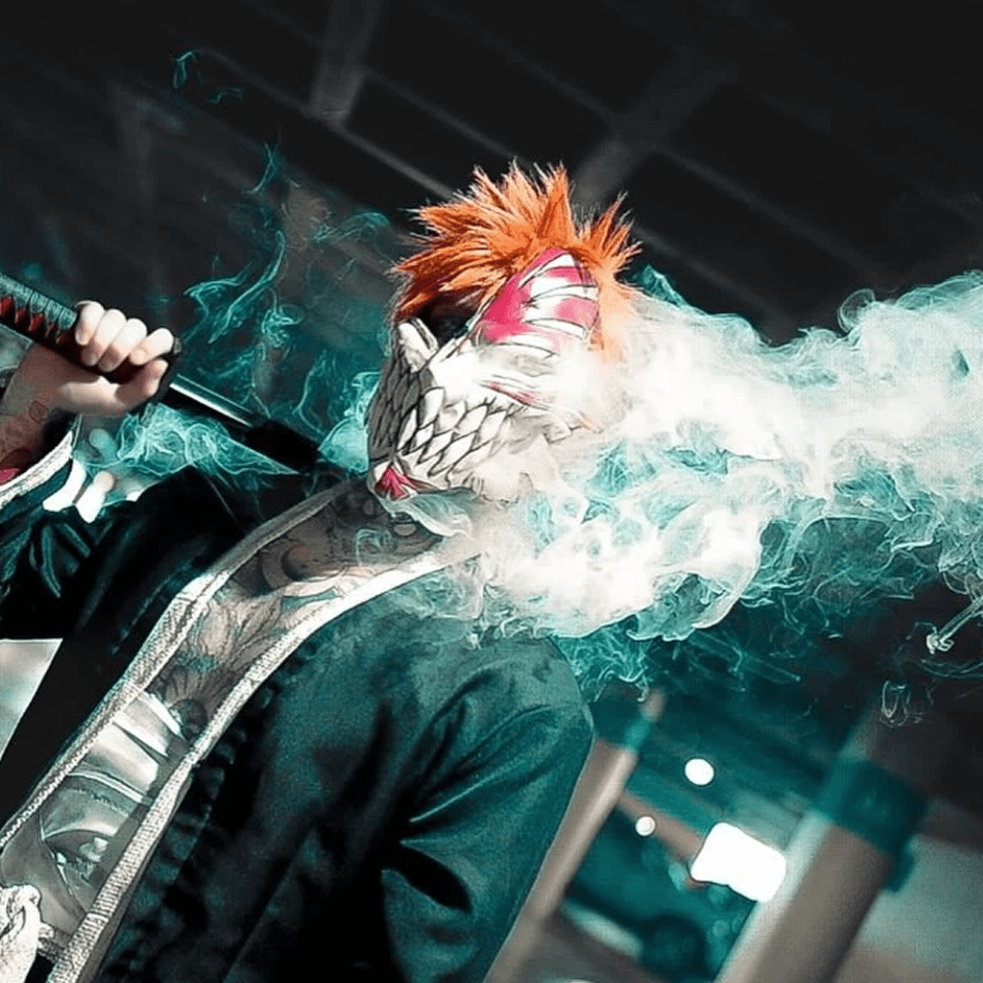 A cosplayer surrounded by on-body smoke effects